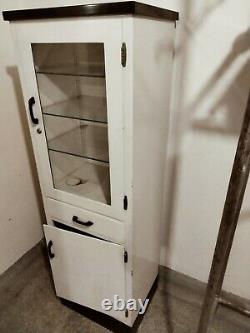 Early 20th century vintage metal medical cabinet by American metal furniture