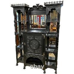 Ebonized Étagère Cabinet with Owl Crest Attributed to Bancroft & Dyer circa 1885