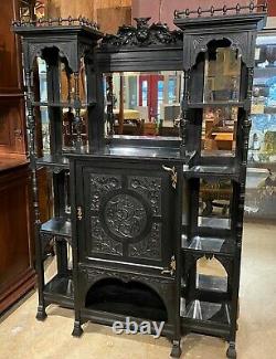 Ebonized Étagère Cabinet with Owl Crest Attributed to Bancroft & Dyer circa 1885