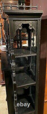 Ebonized Étagère Cabinet with Owl Crest Attributed to Bancroft & Dyer circa 1885