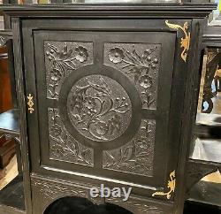 Ebonized Étagère Cabinet with Owl Crest Attributed to Bancroft & Dyer circa 1885