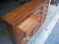 Fine Country Store Oak Clothing Display With 15 Drawers