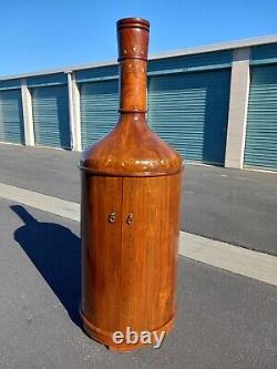 Handcrafted Bottle Shaped Antique Liquor Cabinet