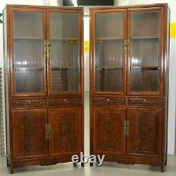 Pair Of Chinese Walnut Cabinets With Glass Doors And Carved Details