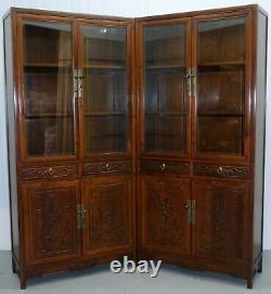 Pair Of Chinese Walnut Cabinets With Glass Doors And Carved Details