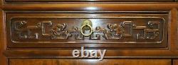 Pair Of Chinese Walnut Cabinets With Glass Doors And Carved Details