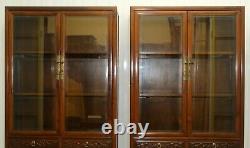 Pair Of Chinese Walnut Cabinets With Glass Doors And Carved Details