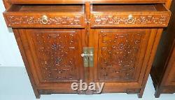 Pair Of Chinese Walnut Cabinets With Glass Doors And Carved Details