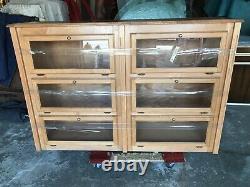 Pair of Maple custom built lighted display cabinets