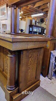 Quarter sawn oak back bar and front bar with carved victorian ladies head