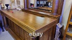 Quarter sawn oak back bar and front bar with carved victorian ladies head