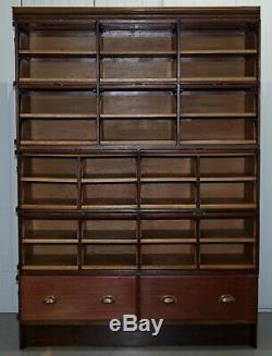 Rare 1920's Haberdashery Stacking Cabinet 10 Retracting Doors 28 Sliding Shelves