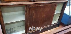 Restored 7 Foot Art Deco Waterfall Glass Front General Store Cabinet