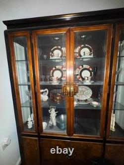 Stunning antique china cabinet with glass doors made of mahogany and cherry wood