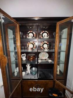 Stunning antique china cabinet with glass doors made of mahogany and cherry wood