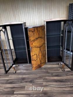 This Is an Asian walnut china cabinet, likely dating from the 1920s to 1930s. I