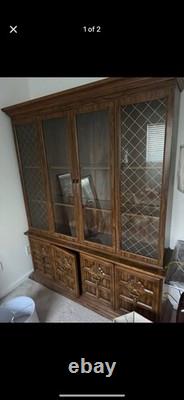 Used antique brown China Cabinet with light switch