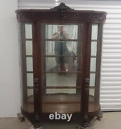 Victorian Carved Oak North Wind Curved Glass Curio Crystal Display Cabinet