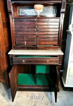 Victorian Era Multi Drawer Dental Cabinet with Marble Surface area
