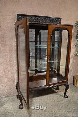 Vintage/Antique Traditional Style Carved Mahogany Two Door Curio withBeveled Glass