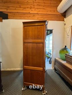 Vintage Belgian Oak Armoire or Dry Bar with Slide-In Doors and Carved Details
