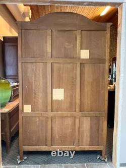 Vintage Belgian Oak Armoire or Dry Bar with Slide-In Doors and Carved Details