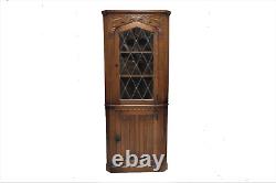 Vintage English Tiger Oak Linen Fold Corner Cabinet