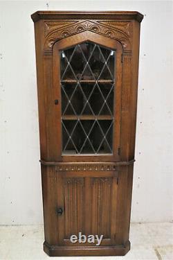 Vintage English Tiger Oak Linen Fold Corner Cabinet