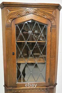 Vintage English Tiger Oak Linen Fold Corner Cabinet