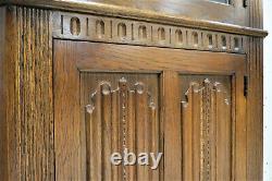 Vintage English Tiger Oak Linen Fold Corner Cabinet