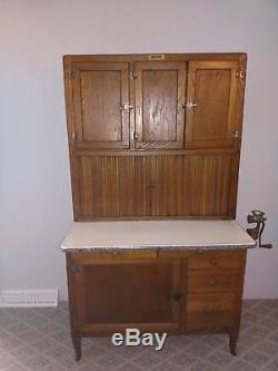 Vintage Hoosier Kitchen Cabinet, dated 1929-50's