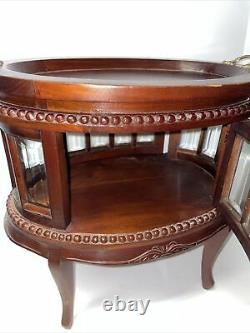 Vintage Mahogany Table Curio Or Tea Cabinet With Two Hinged Doors And Oval Shape