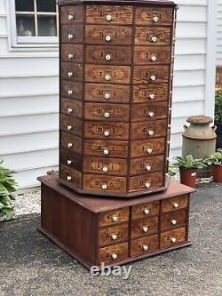 Vintage Wooden Antique rotating octagon hardware store cabinet