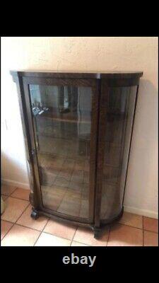 Vintage/antique curio cabinet with rounded glass