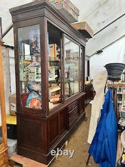 Vintage antique oak country store display cabinet 94 L x 25 D x 97 H 2 door