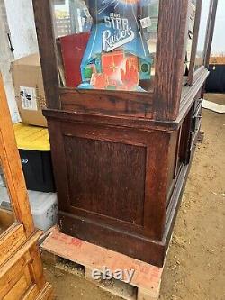 Vintage antique oak country store display cabinet 94 L x 25 D x 97 H 2 door