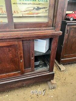 Vintage antique oak country store display cabinet 94 L x 25 D x 97 H 2 door