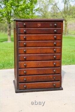 Vintage apothecary cabinet wood drawer antique typeset letterpress watchmaker