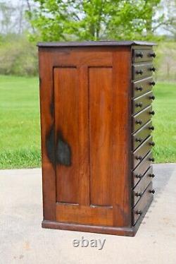 Vintage apothecary cabinet wood drawer antique typeset letterpress watchmaker