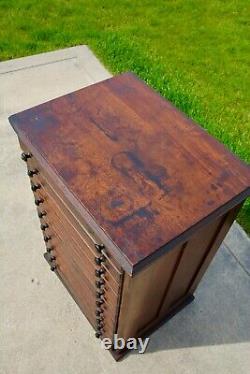 Vintage apothecary cabinet wood drawer antique typeset letterpress watchmaker