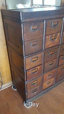 Vintage circa 1910 Oak five section stacking 24 drawer Globe file cabinet
