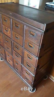 Vintage circa 1910 Oak five section stacking 24 drawer Globe file cabinet