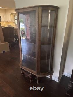 Vintage curved glass curio cabinet