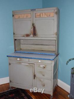 Vintage hoosier style kitchen cabinet by McDougall original green paint