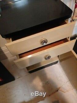 Vintage medical cabinet a. S. Aloe co. Metal 2 drawer mcm stand tan black chrome