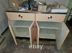 Vintage metal storage cabinet with drawers