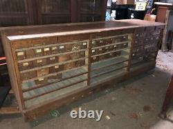 Vintage oak hardware store counter cabinet galvanized drawers 94 x 33h x 25.75