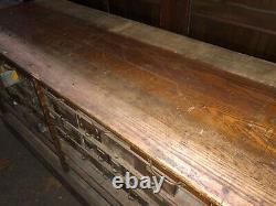 Vintage oak hardware store counter cabinet galvanized drawers 94 x 33h x 25.75