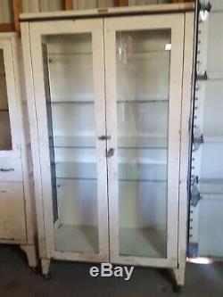 Vintage white medical cabinets