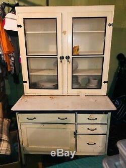 White, Hoosier style cabinet, by Ariel Cabinet Company in Peru, Indiana 1920s